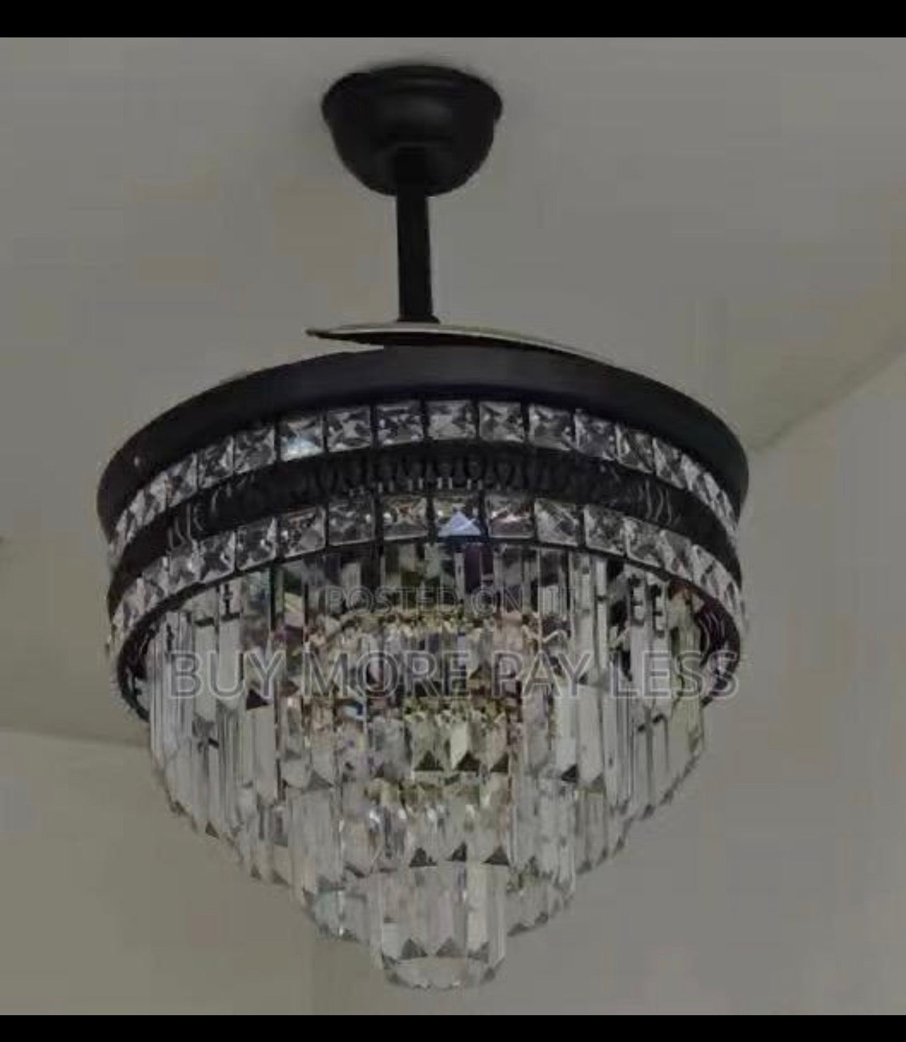 Hybrid retractable ceiling fan and chandelier